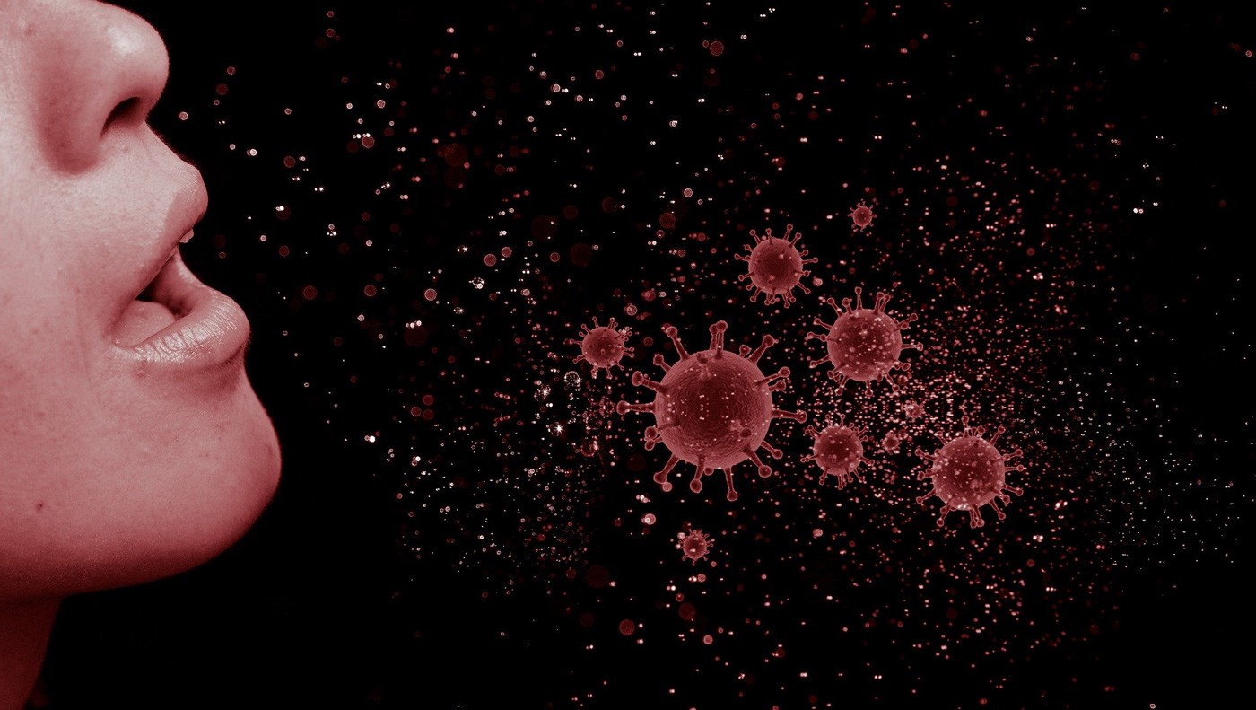 Ilustrasi droplet dan virus corona yang keluar ketika seseorang sedang bersin